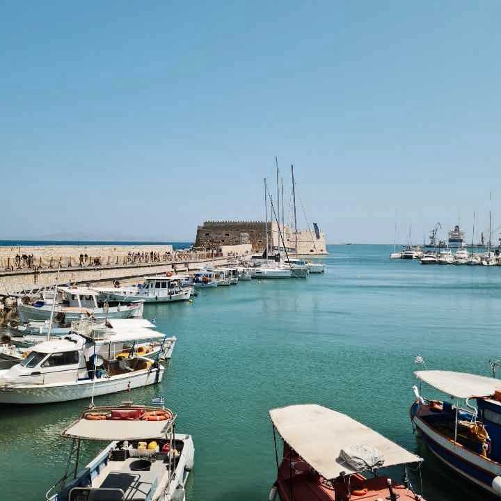 harbour with fortress, visible yachts on the shore