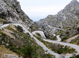 a winding road in the mountains