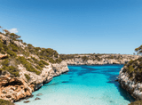 turquoise water in a valley surrounded by rocks