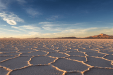 cracked earth against a cloudless sky