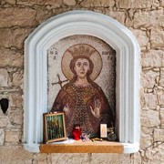 image of Saint Barbara on a stone wall