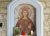 image of Saint Barbara on a stone wall