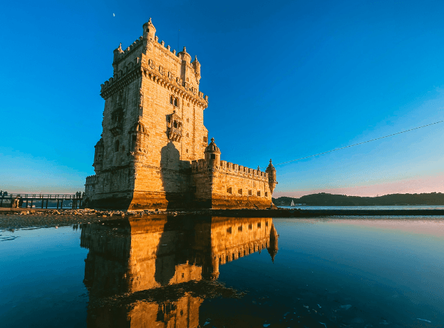 stone high tower over the water